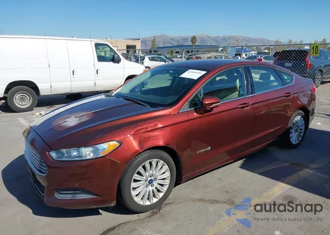 2015 Ford Fusion Hybrid Se z USA, uszkodzony, nr VIN 3FA6P0LU9FR229439
